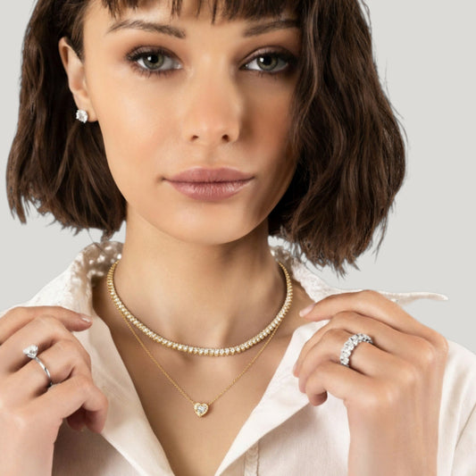 CHOE 1 carat heart moissanite necklace in 14K gold vermeil on model