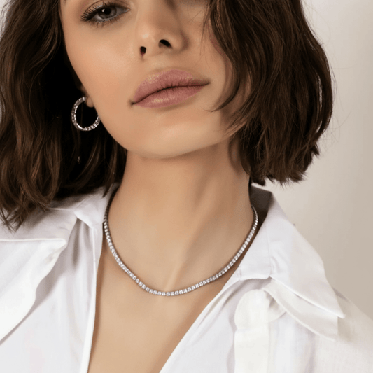 CHOE classic tennis necklace - hero shot of woman wearing tennis necklace