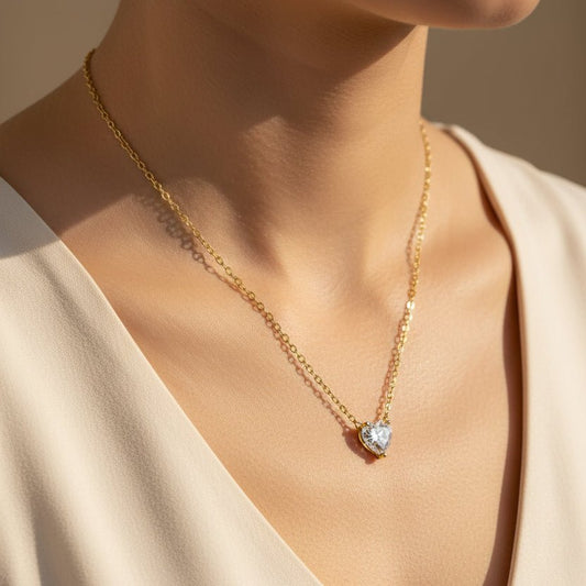 Heart shaped diamond pendant necklace on a model