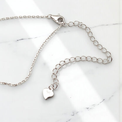 Close-up of CHOE sterling silver chain with lobster clasp