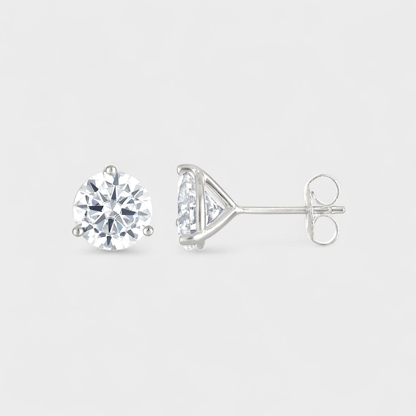 CHOE round moissanite stud earrings in sterling silver with 3-prong setting