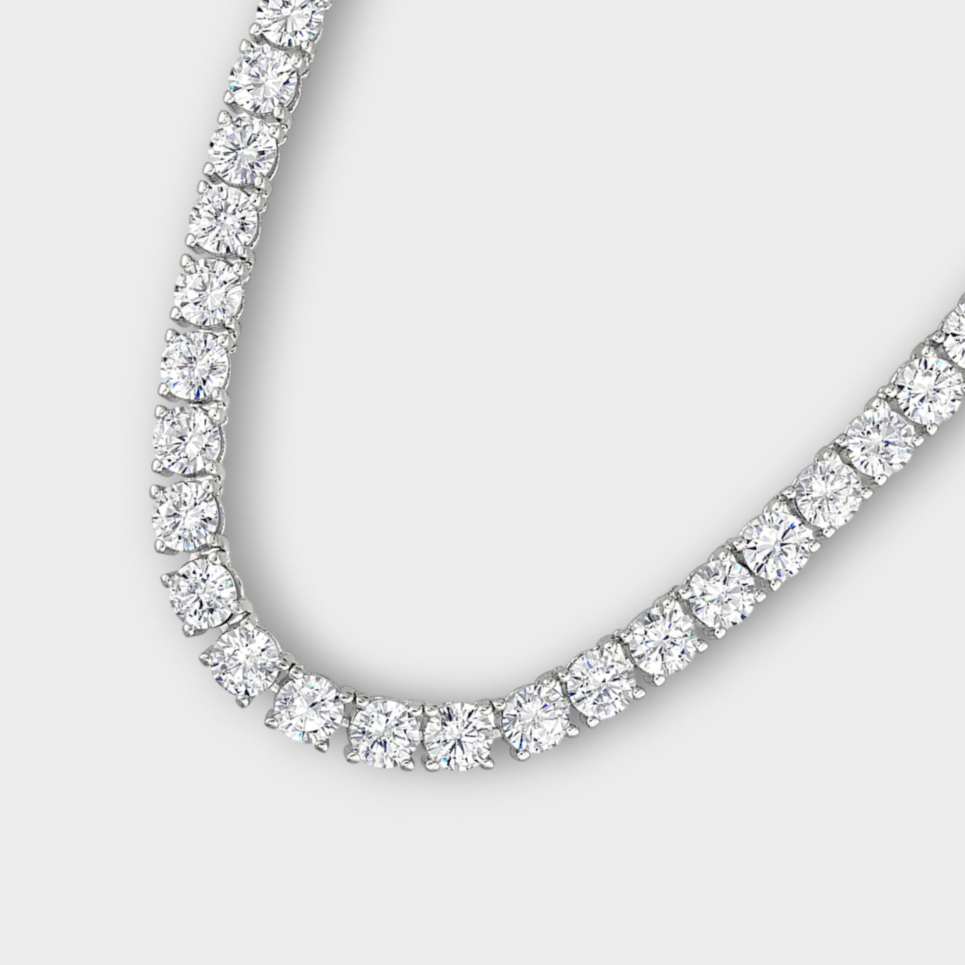 Close-up of CHOE tennis necklace with round four prong setting in sterling silver