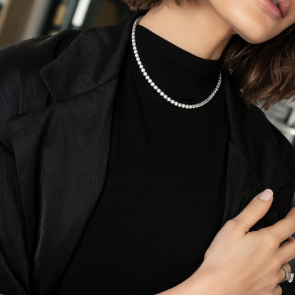 CHOE round bezel tennis necklace in rhodium-plated sterling silver on model