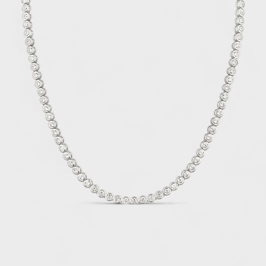 CHOE sterling silver tennis necklace with cubic zirconia bezel setting - hero shot.