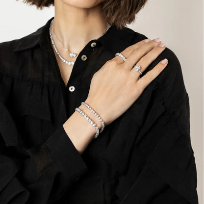 Person wearing CHOE tennis bracelets in silver - hero shot