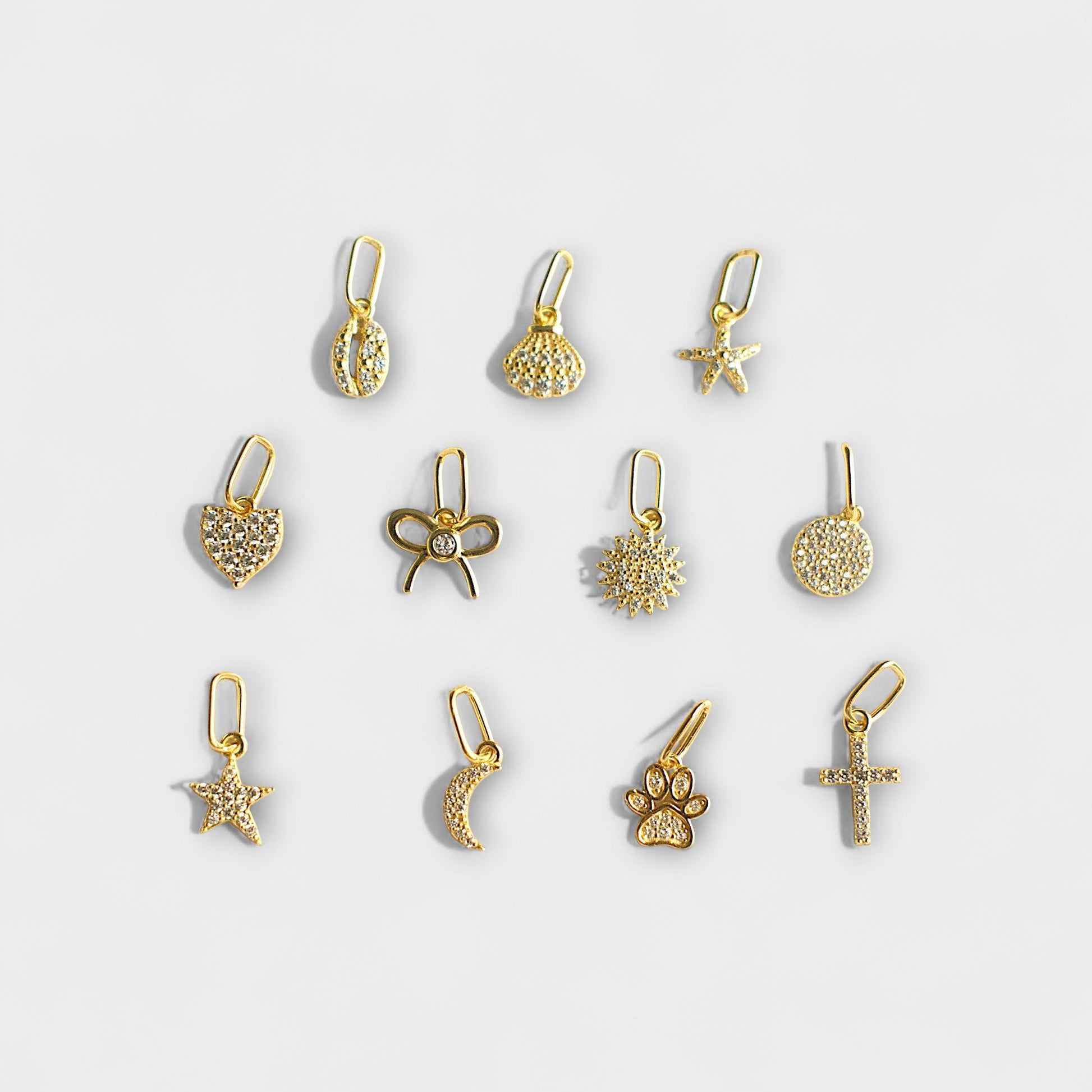 FYB gold plated charm collection - hero shot