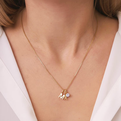  FYB personalized initial necklace in 18K gold plated sterling silver on a model's neck