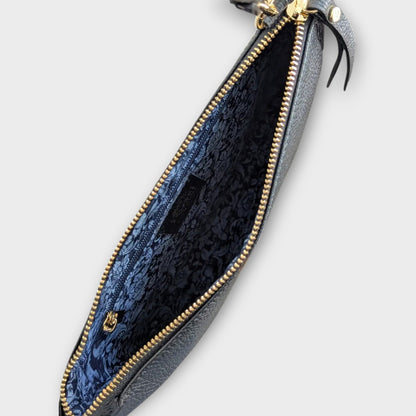 Rossi black pouch - interior view of navy blue floral lining, interior zipper and external gold zipper