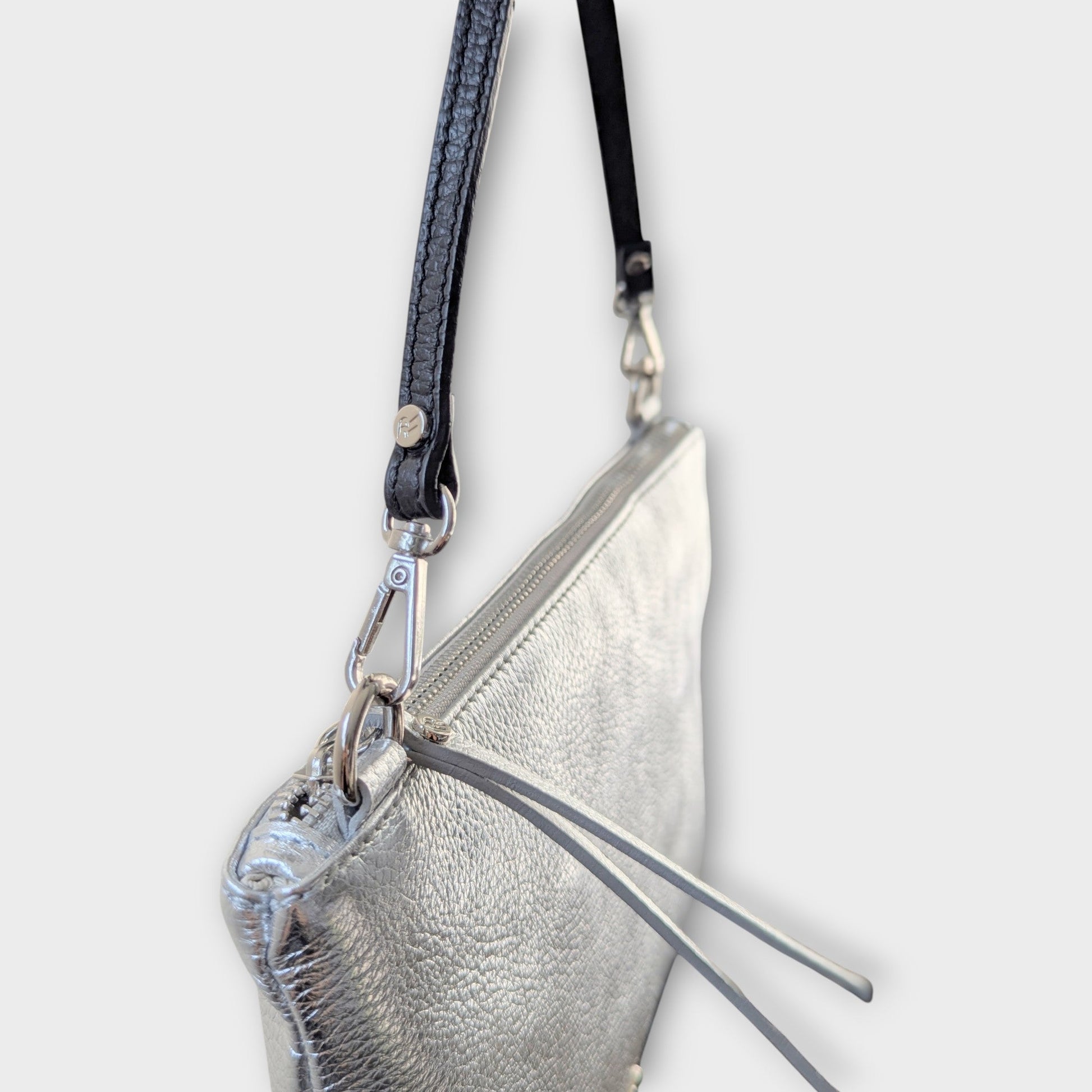 Rossi silver pouch with short black strap - top side angle view